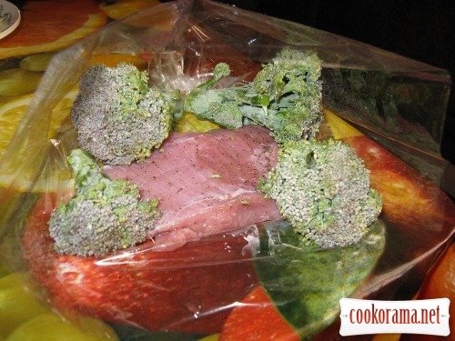 Dairy meat with broccoli in baking bag