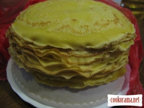 Pancakes with banana and curd, baked in a delicate cream