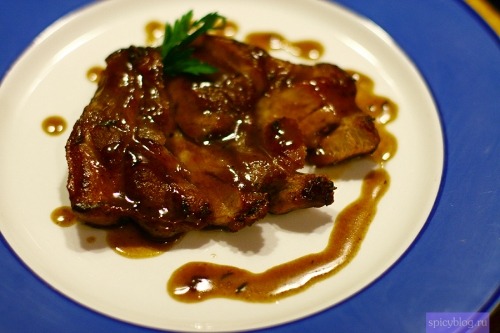 Stake from pork neck with cognac sauce